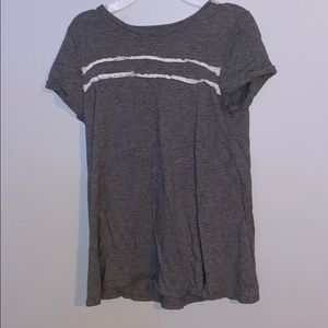 grey shirt w white ruffles